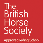 Logo of The British Horse Society for an Approved Riding School, red background with white text