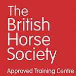 Logo of The British Horse Society Approved Training Centre on a red background